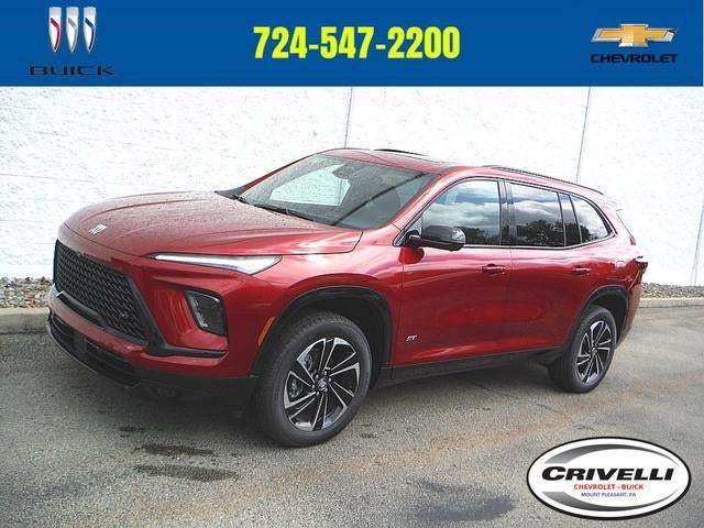 2026 Buick Enclave Sport Touring in Cherry Red Tintcoat — front three-quarter view